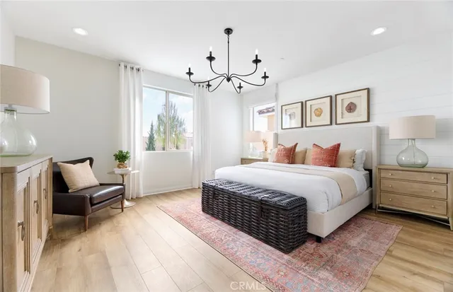 a bedroom with a large bed and furniture