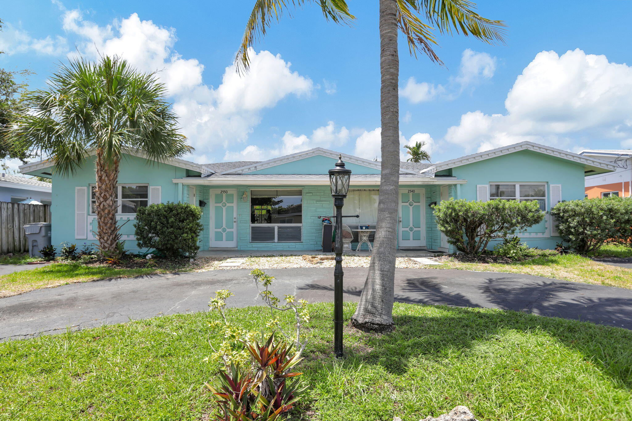 a view of a yard in front of a house