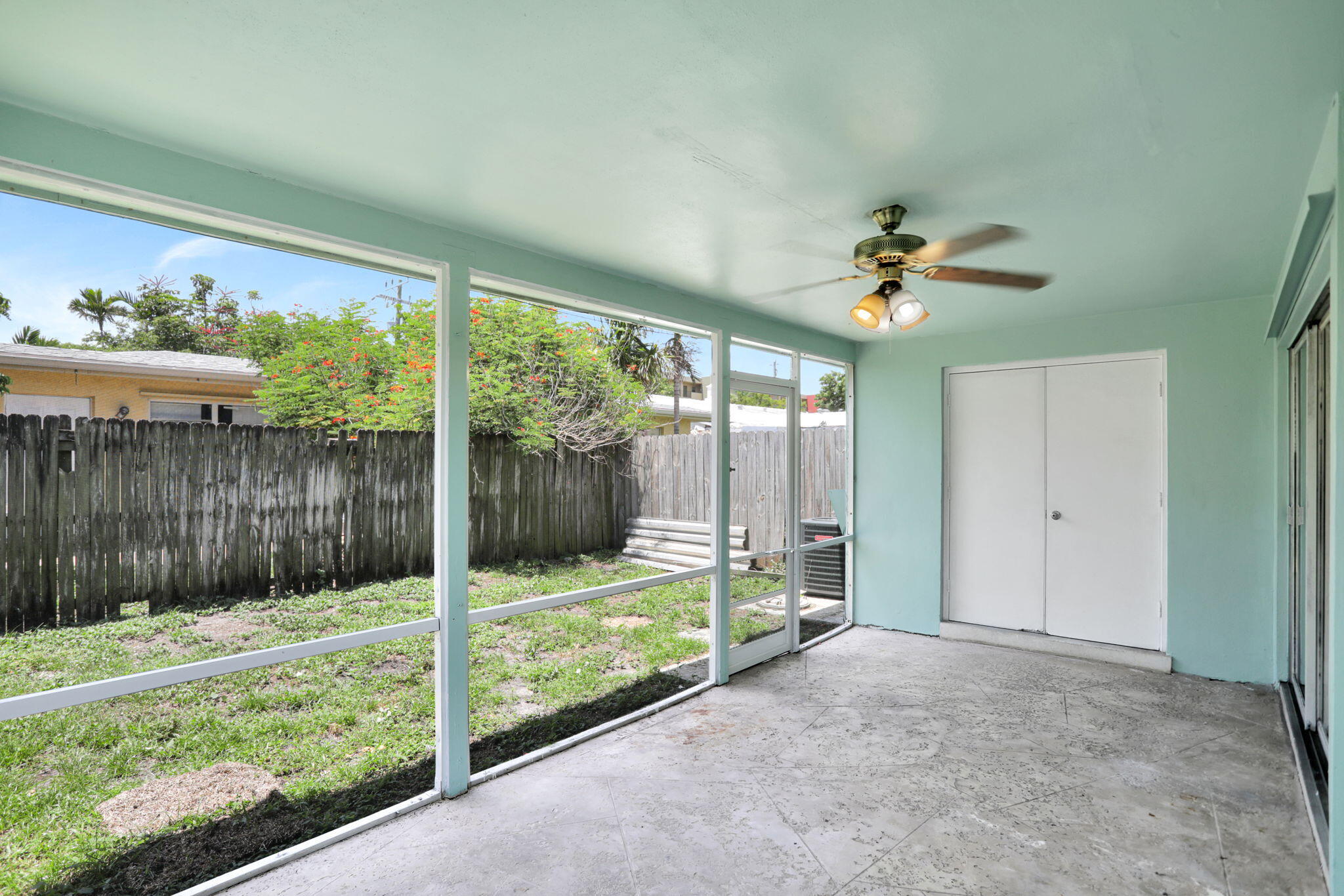 2540-2550 Northeast 10th Court, Unit 12 Pompano Beach, FL 33062 - Photo 11 of 25 a view of a porch with a backyard