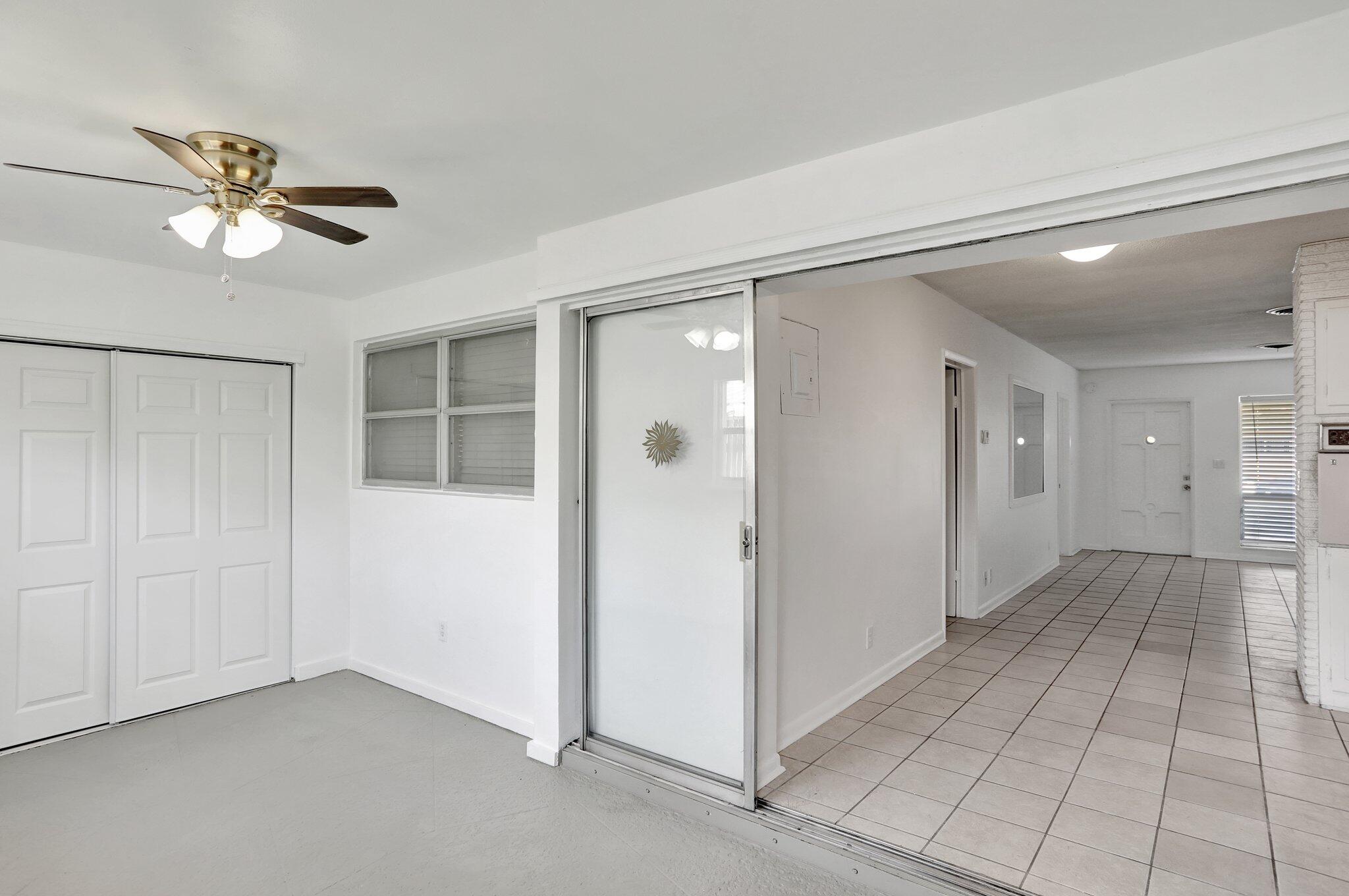 2540-2550 Northeast 10th Court, Unit 12 Pompano Beach, FL 33062 - Photo 22 of 25 a view of an empty room