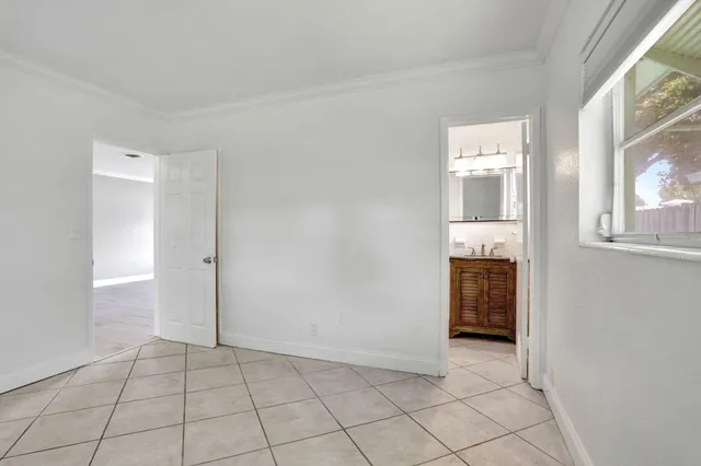 a view of an empty room and window