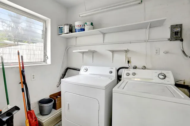 a utility room with dryer and washer