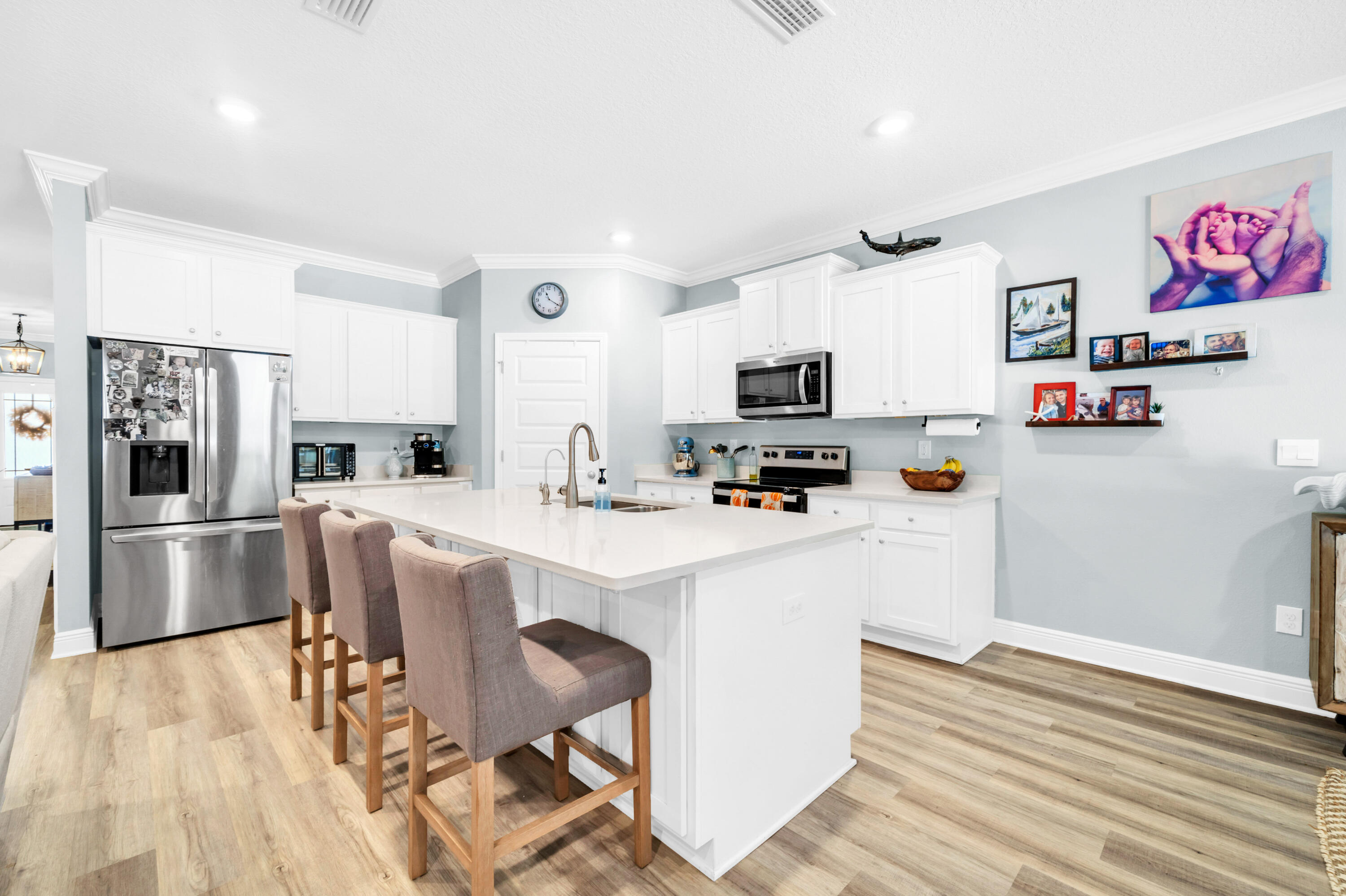 178 Piper Cove Santa Rosa Beach, FL 32459 - Photo 2 of 43 White Cabinets and Island Seating