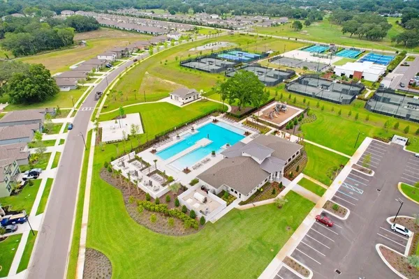 an aerial view of a house with a ocean view
