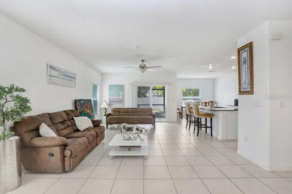 a living room with furniture and a table