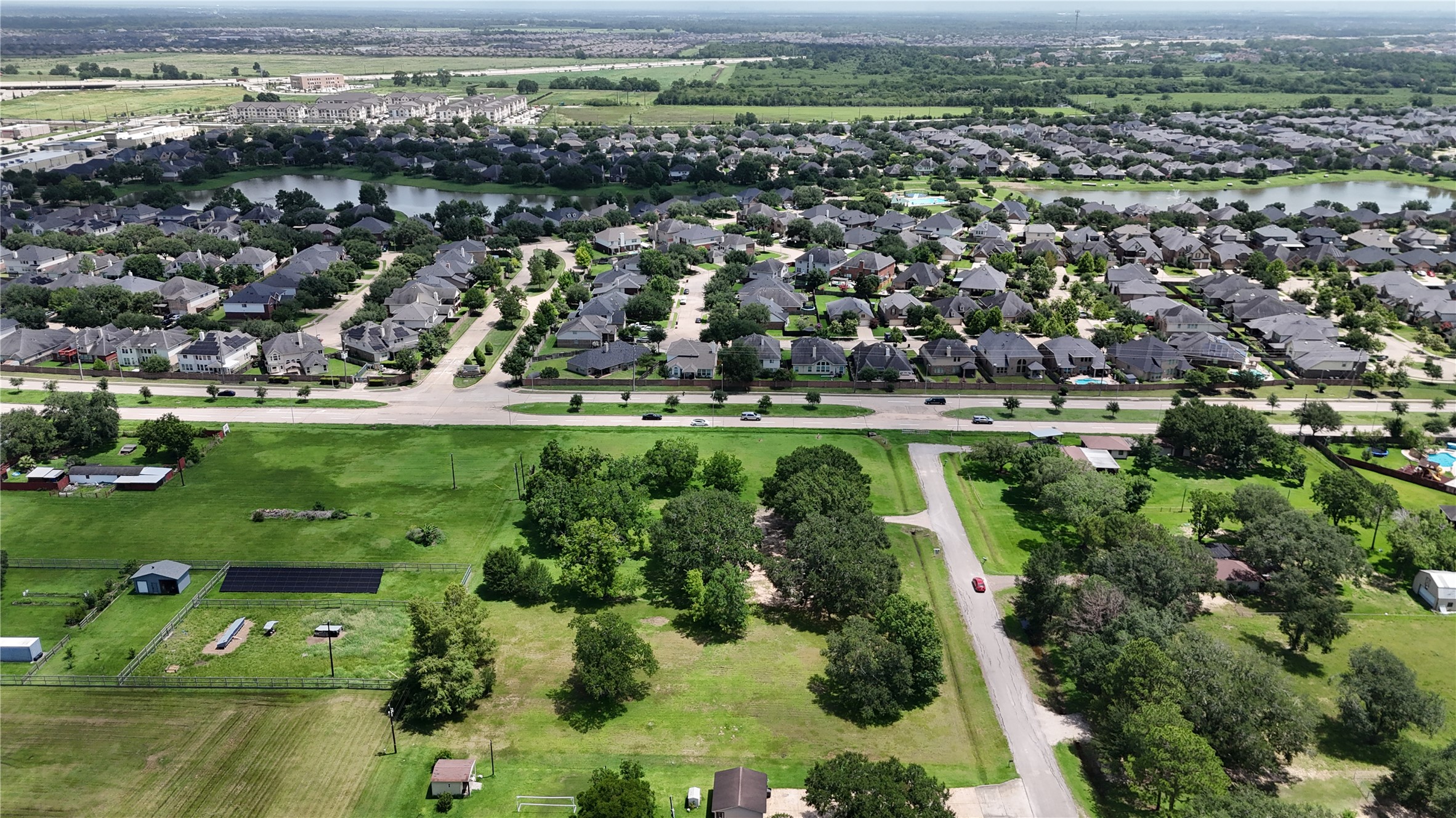 602 Sycamore Road Richmond, TX 77469 - Photo 19 of 22 an aerial view of residential houses with outdoor space