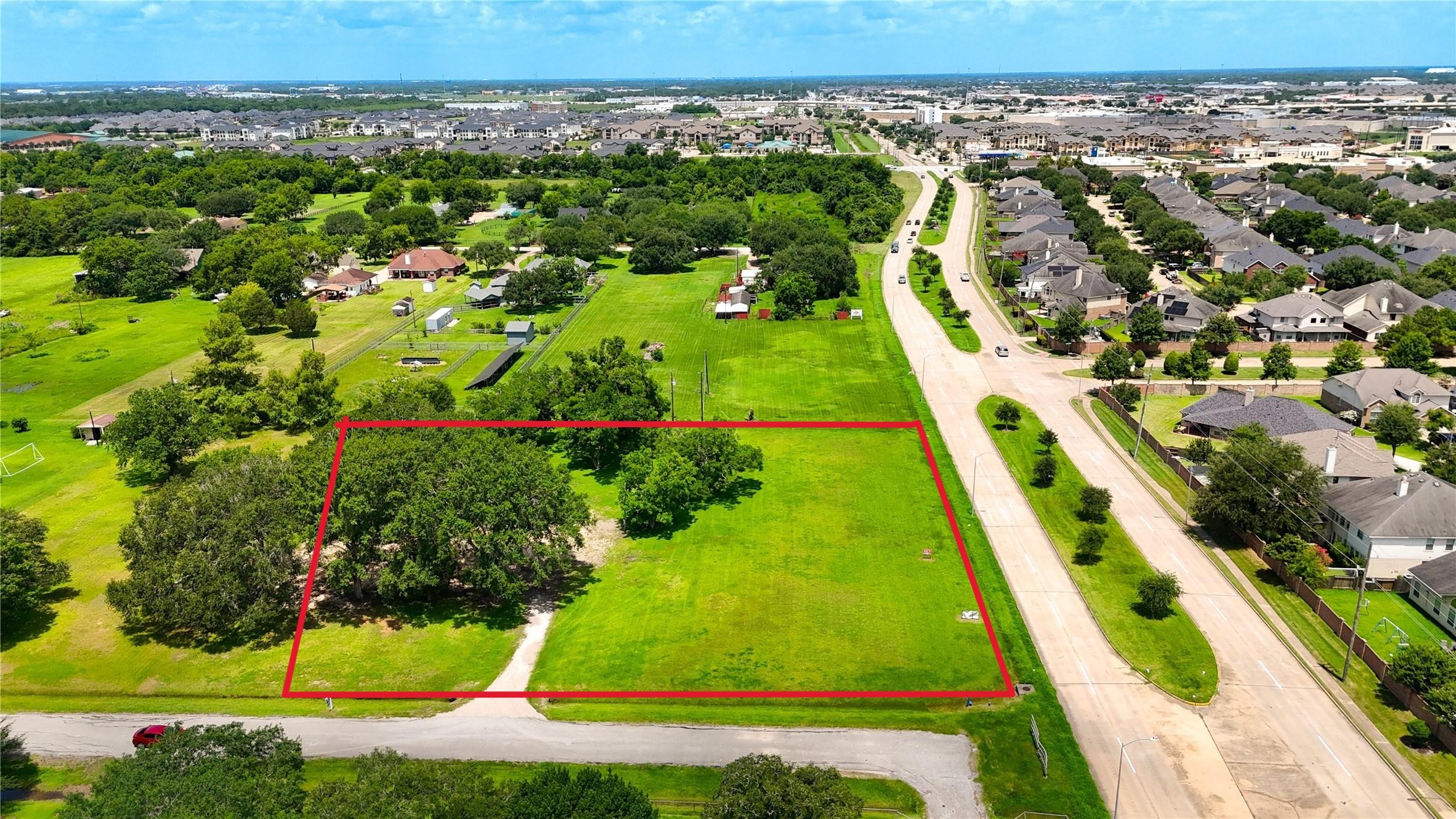602 Sycamore Road Richmond, TX 77469 - Photo 2 of 22 an aerial view of residential houses with outdoor space