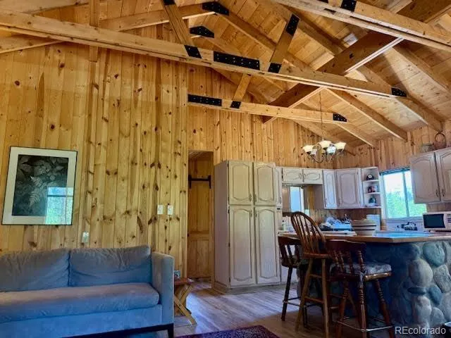 a bedroom with a bed and a mirror