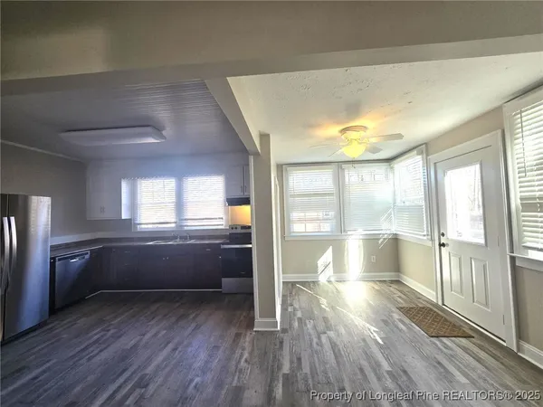 a room with window and wooden floor