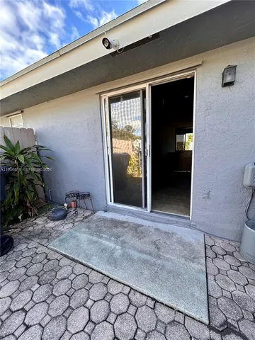 a view of a room that has a bench in it
