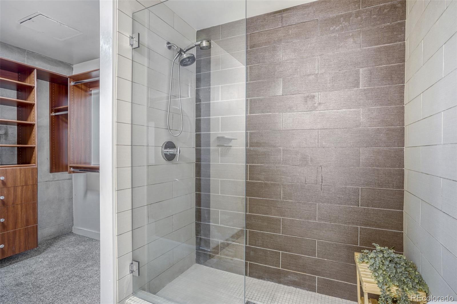 891 14th Street, Unit 1917 Denver, CO 80202 - Photo 17 of 29 a bathroom with a shower