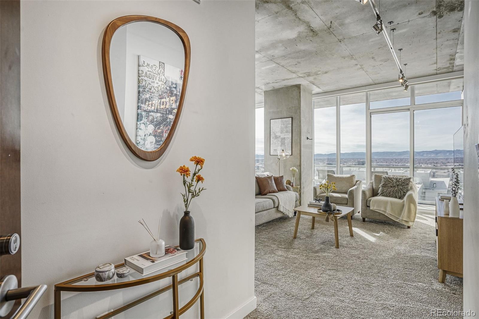 891 14th Street, Unit 1917 Denver, CO 80202 - Photo 2 of 29 a very nice looking living room with a large window