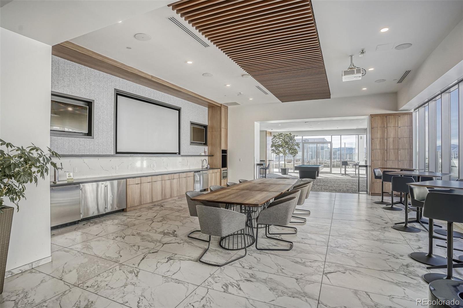 891 14th Street, Unit 1917 Denver, CO 80202 - Photo 22 of 29 a outdoor space with lots of tables a window and chairs