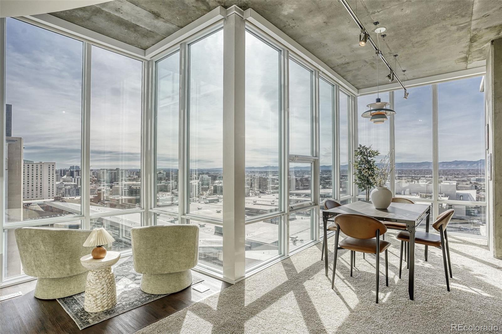 891 14th Street, Unit 1917 Denver, CO 80202 - Photo 5 of 29 a view of a dining room with furniture window and outside view