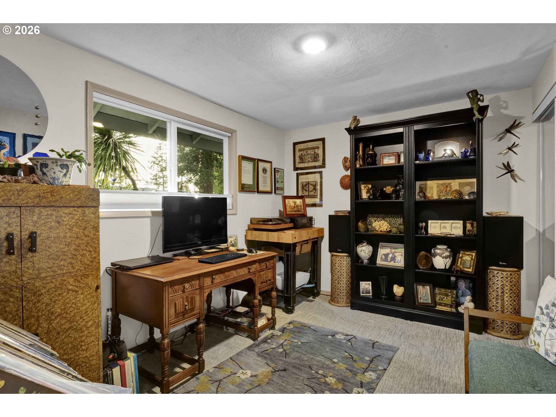 2060 20th Street Florence, OR 97439 - Photo 11 of 37 a view of a workspace with furniture
