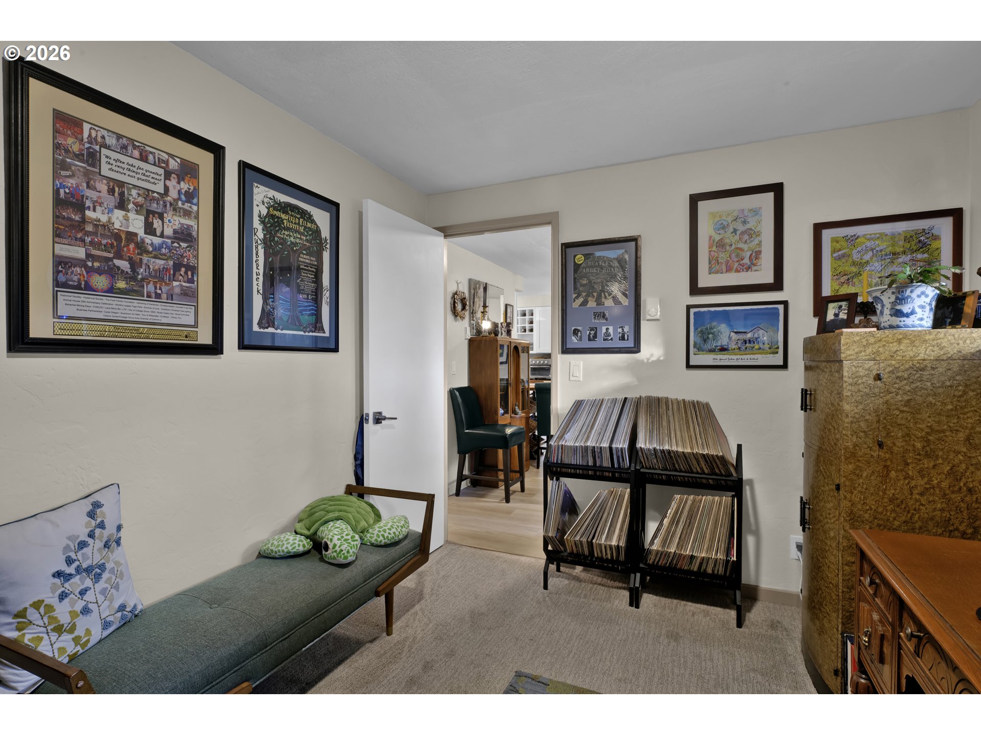 2060 20th Street Florence, OR 97439 - Photo 12 of 37 a living room with furniture and a flat screen tv