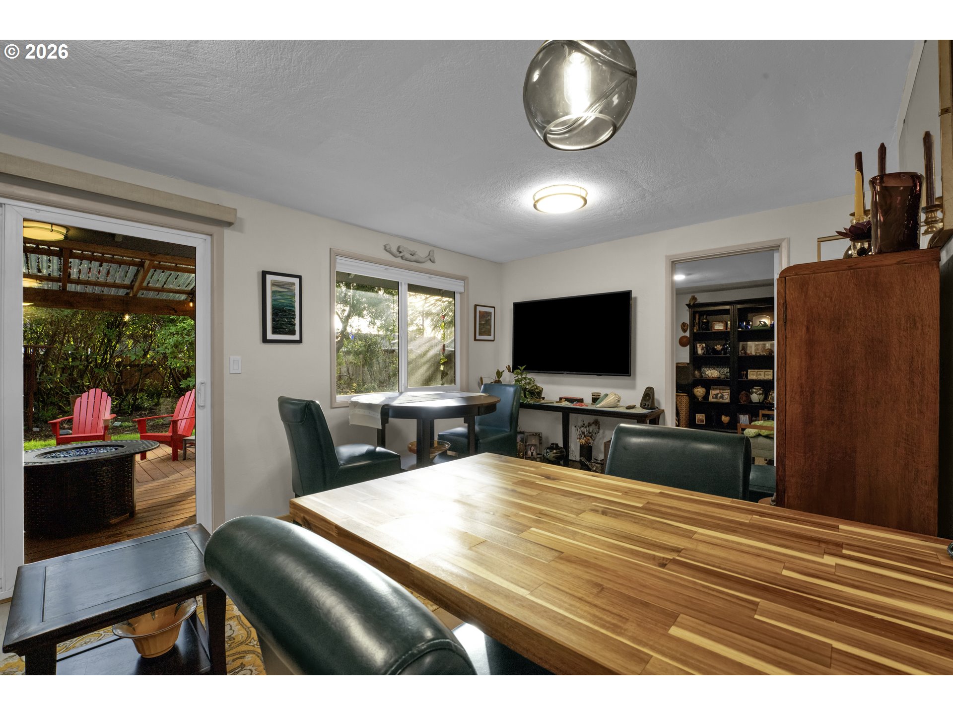 2060 20th Street Florence, OR 97439 - Photo 19 of 37 a living room with furniture and a flat screen tv