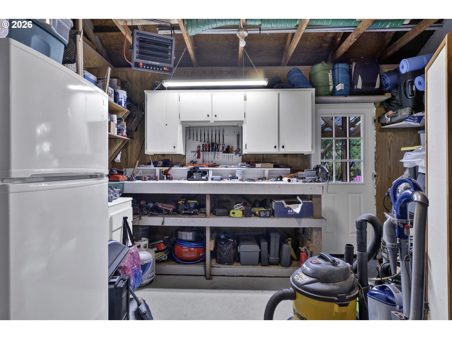 2060 20th Street Florence, OR 97439 - Photo 23 of 37 a utility room with lots of wooden furniture