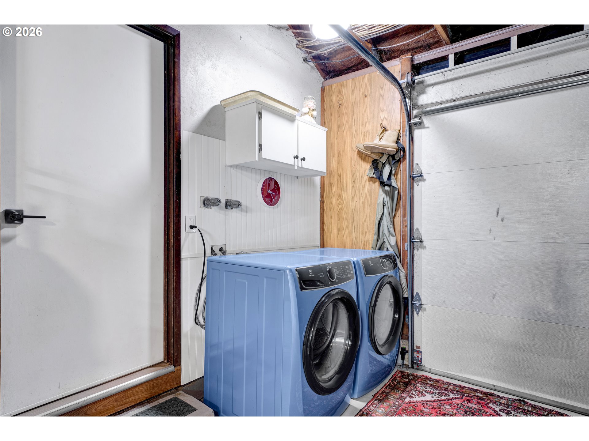 2060 20th Street Florence, OR 97439 - Photo 24 of 37 a view of storage and utility room with washer and dryer