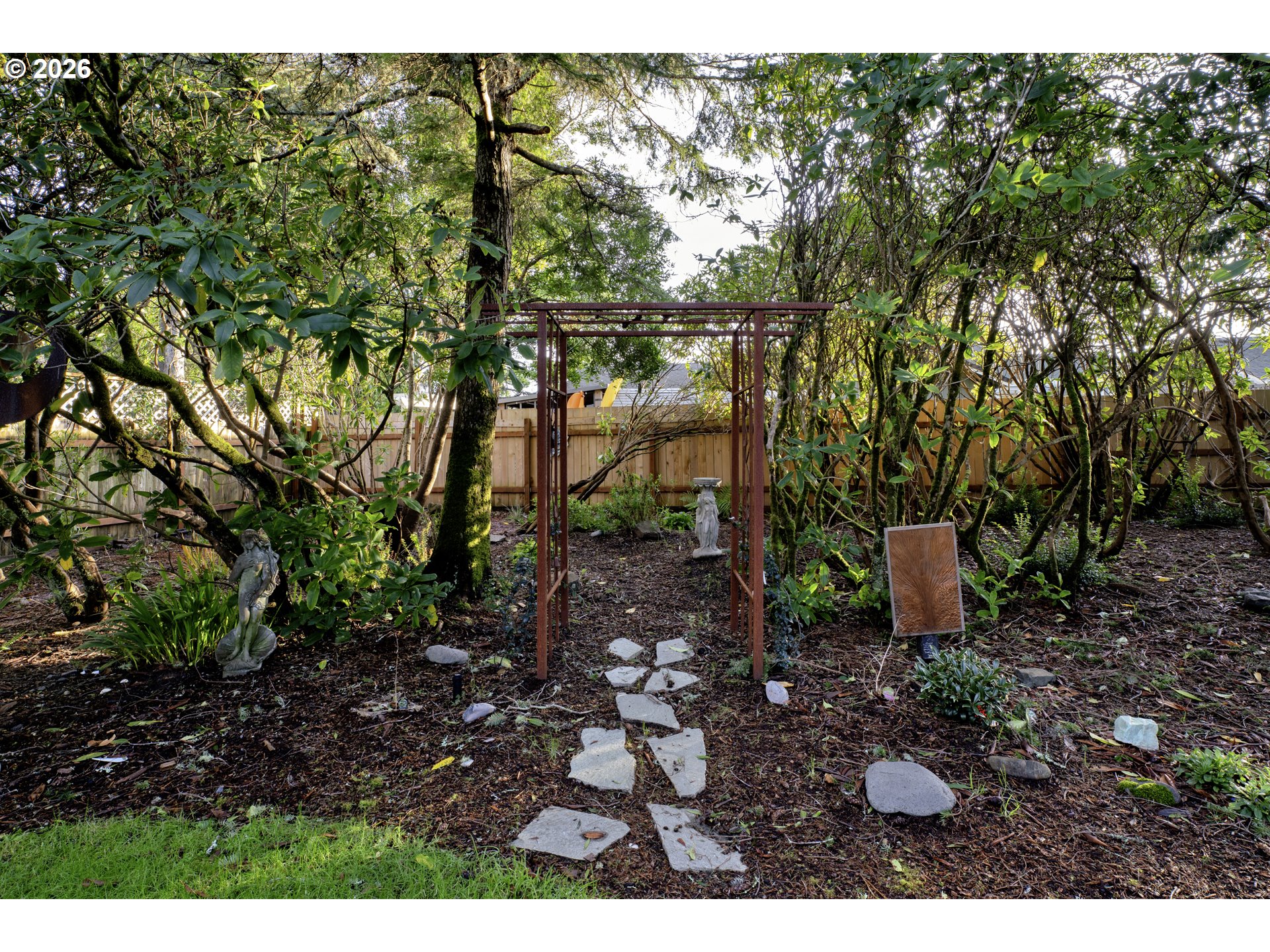 2060 20th Street Florence, OR 97439 - Photo 30 of 37 a view of a backyard