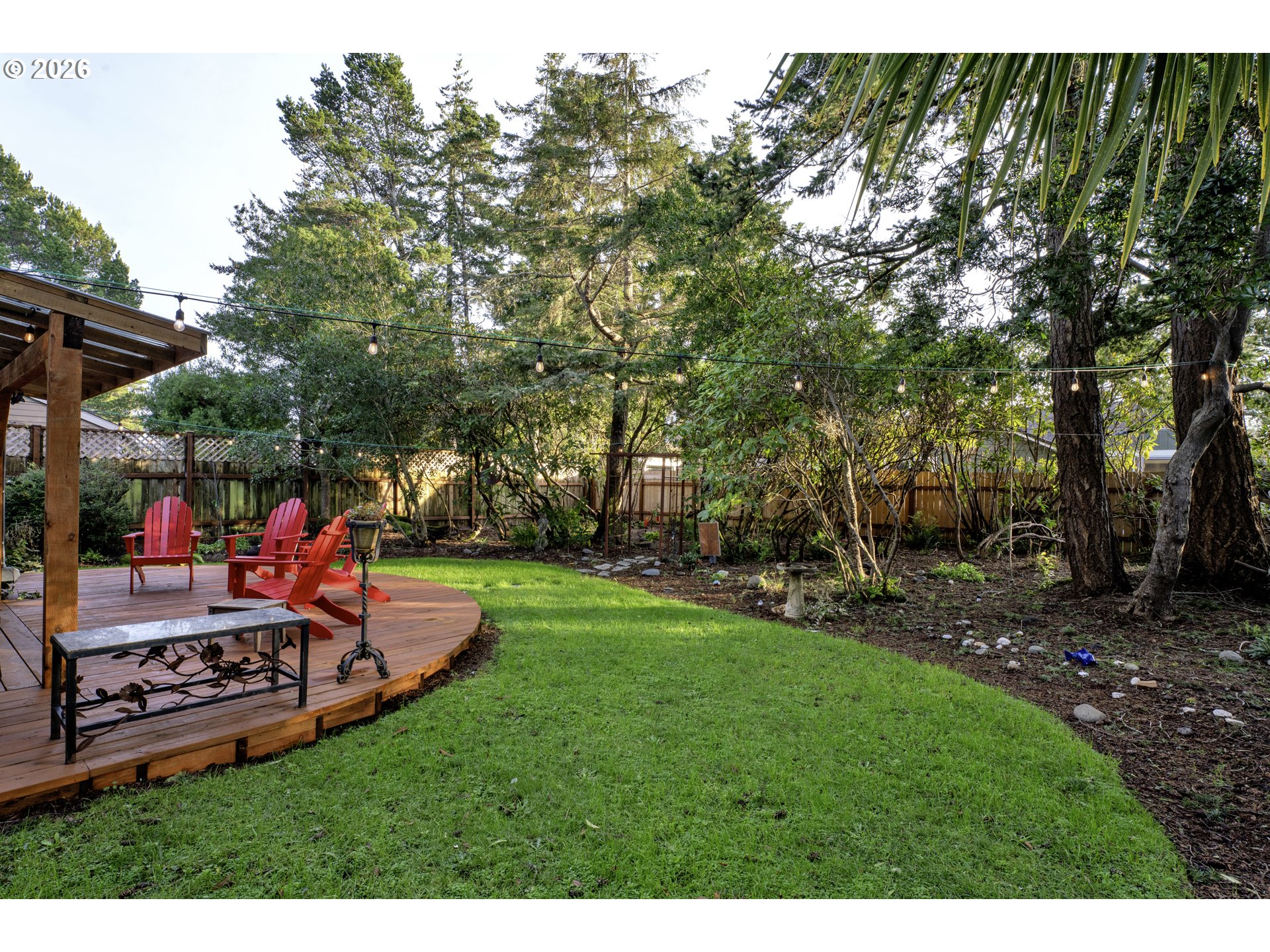 2060 20th Street Florence, OR 97439 - Photo 32 of 37 a view of a park with large trees