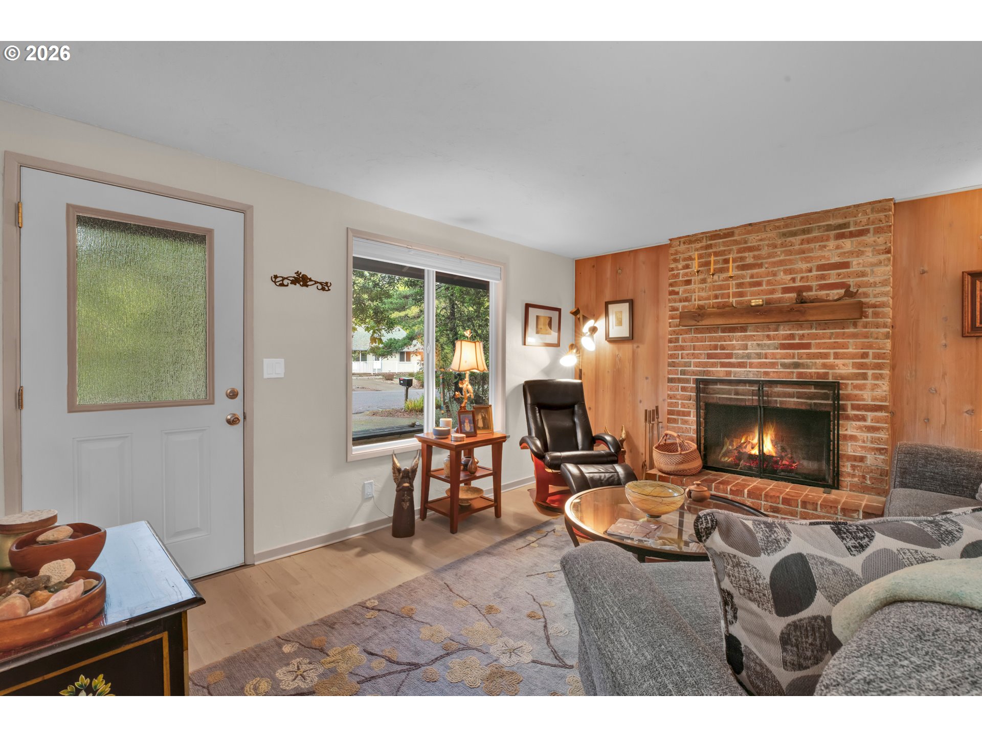 2060 20th Street Florence, OR 97439 - Photo 4 of 37 a living room with furniture and a fireplace