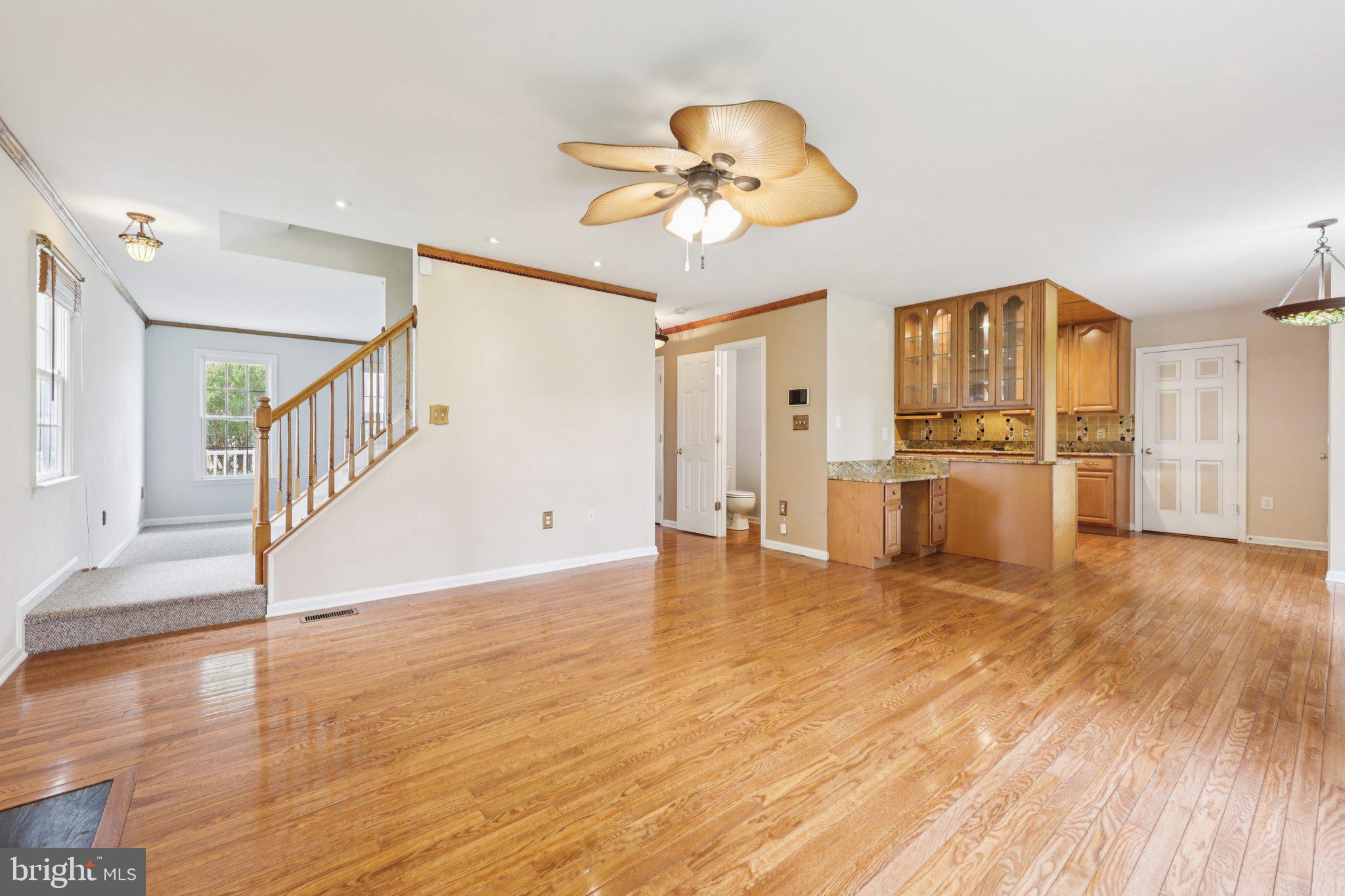 11607 River Meadows Way Fredericksburg, VA 22408 - Photo 24 of 67 a view of a livingroom with wooden floor