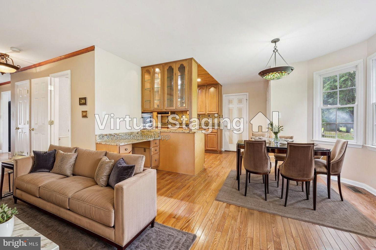 11607 River Meadows Way Fredericksburg, VA 22408 - Photo 25 of 67 a living room with furniture and a wooden floor