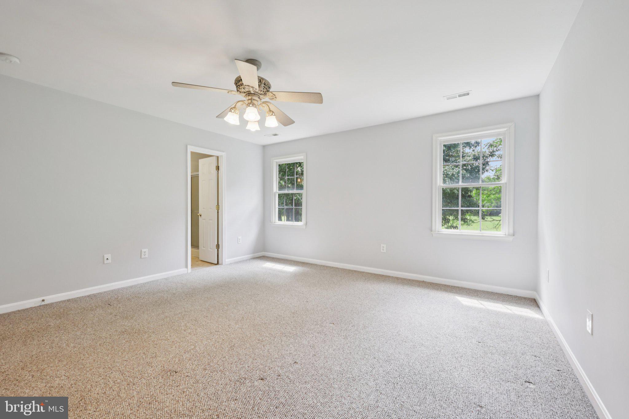 11607 River Meadows Way Fredericksburg, VA 22408 - Photo 34 of 67 a view of an empty room with a window