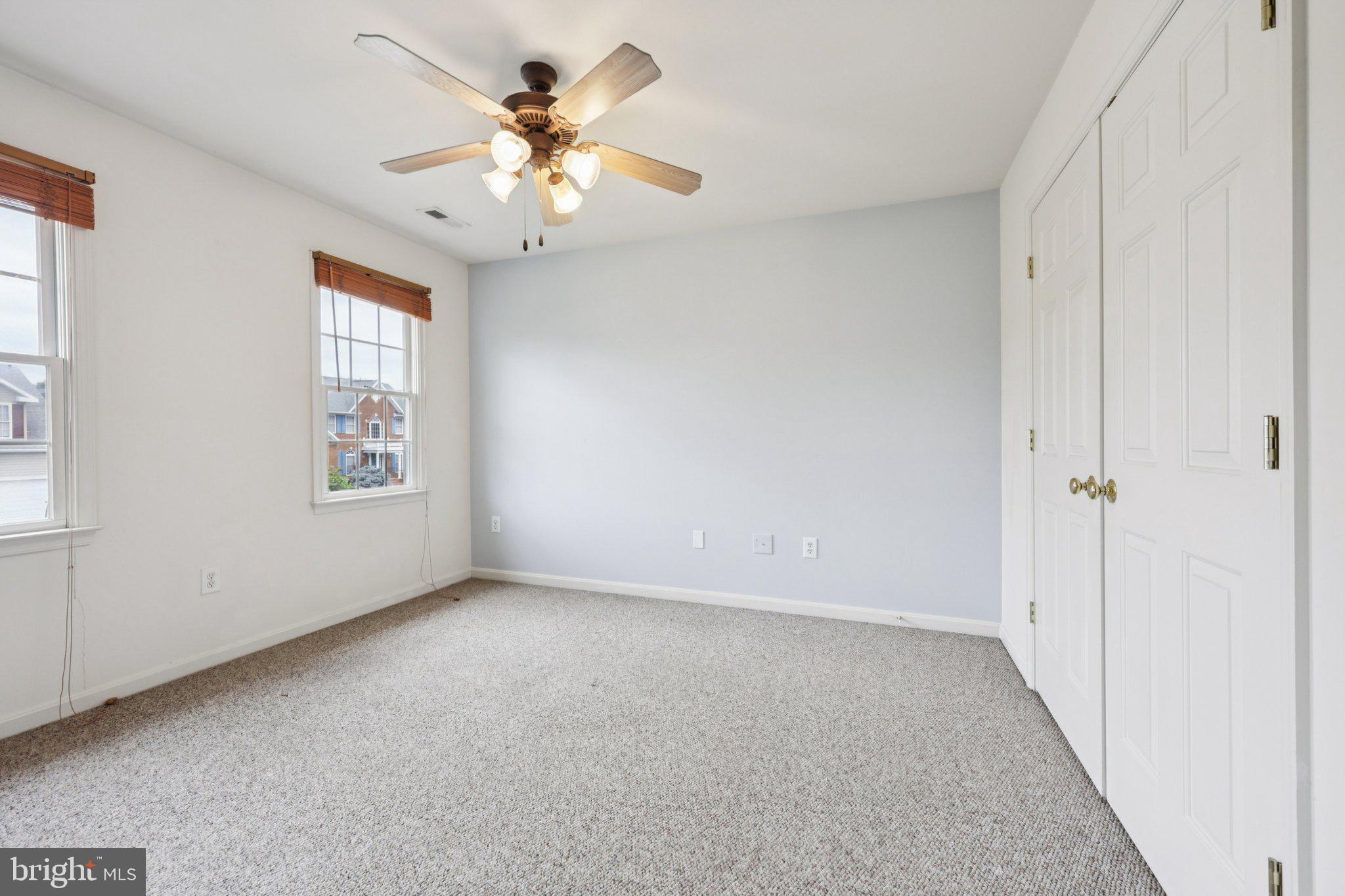 11607 River Meadows Way Fredericksburg, VA 22408 - Photo 40 of 67 a view of an empty room with a window