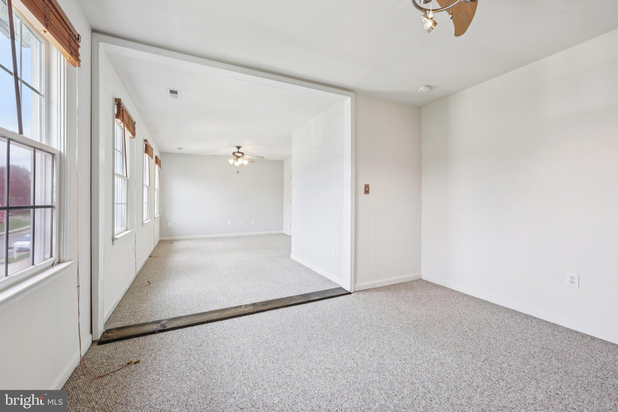 11607 River Meadows Way Fredericksburg, VA 22408 - Photo 44 of 67 wooden floor in an empty room with a window
