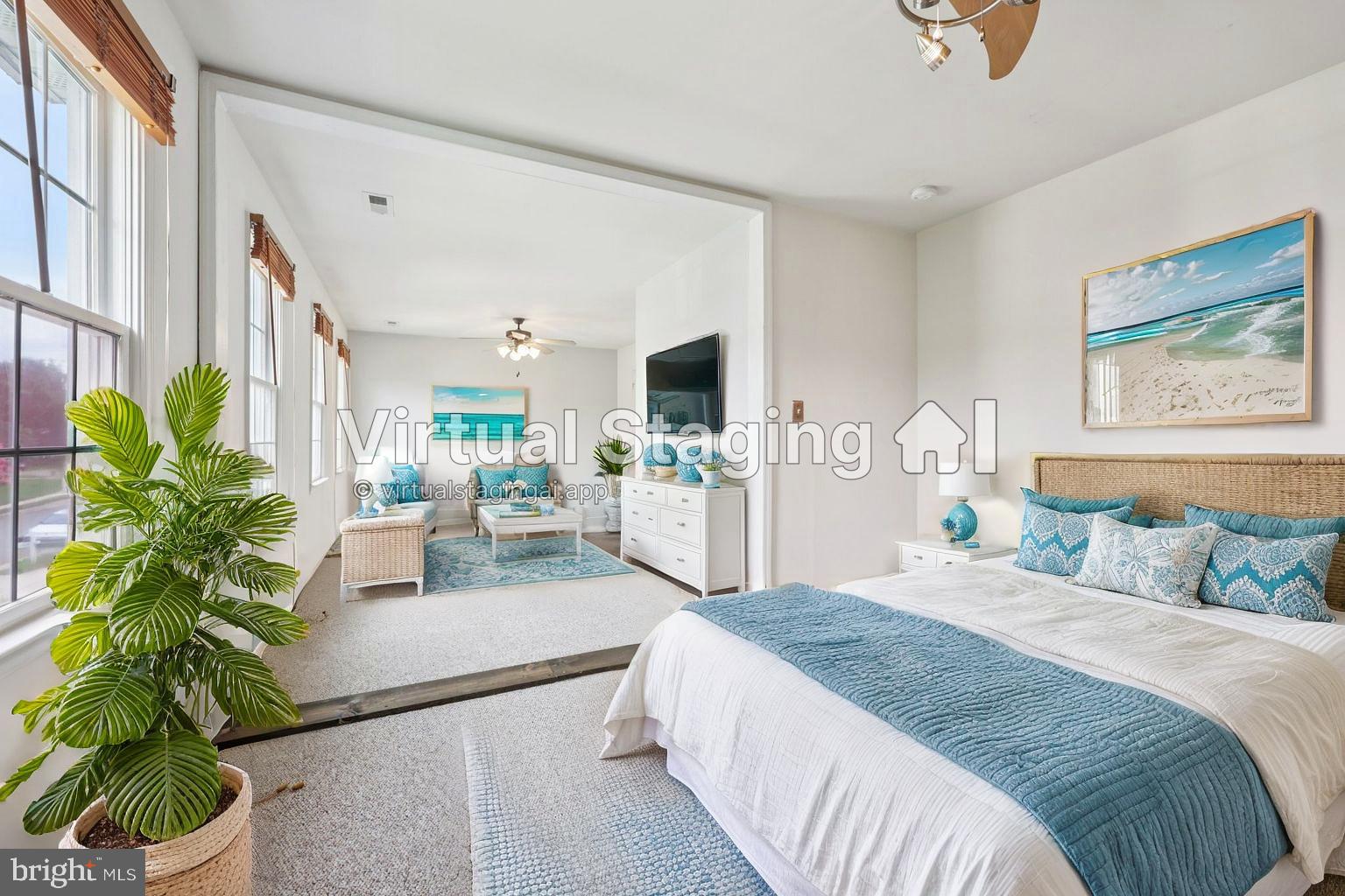 11607 River Meadows Way Fredericksburg, VA 22408 - Photo 45 of 67 a bedroom with a large bed a potted plant and a window