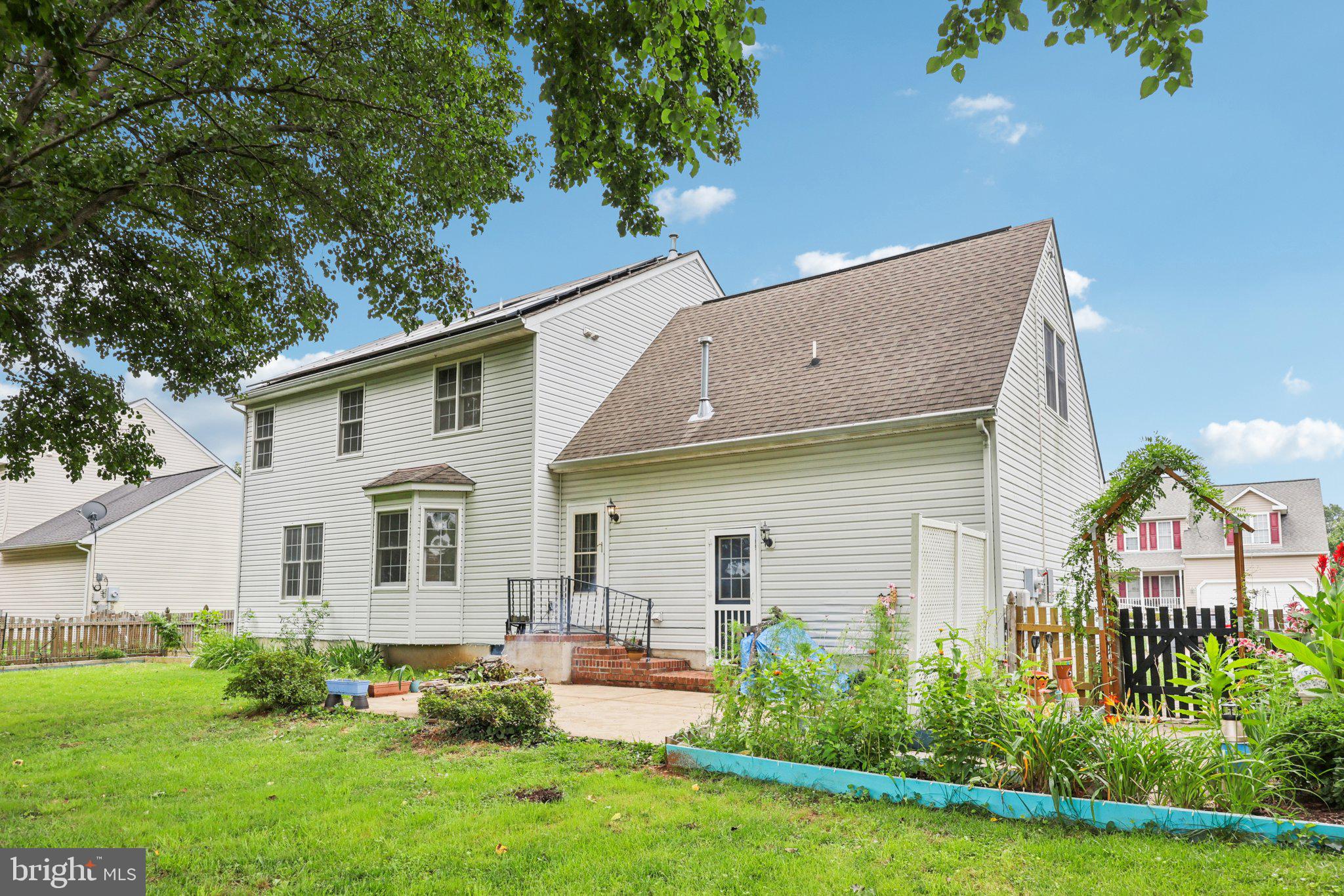 11607 River Meadows Way Fredericksburg, VA 22408 - Photo 58 of 67 a view of a house with backyard and sitting area