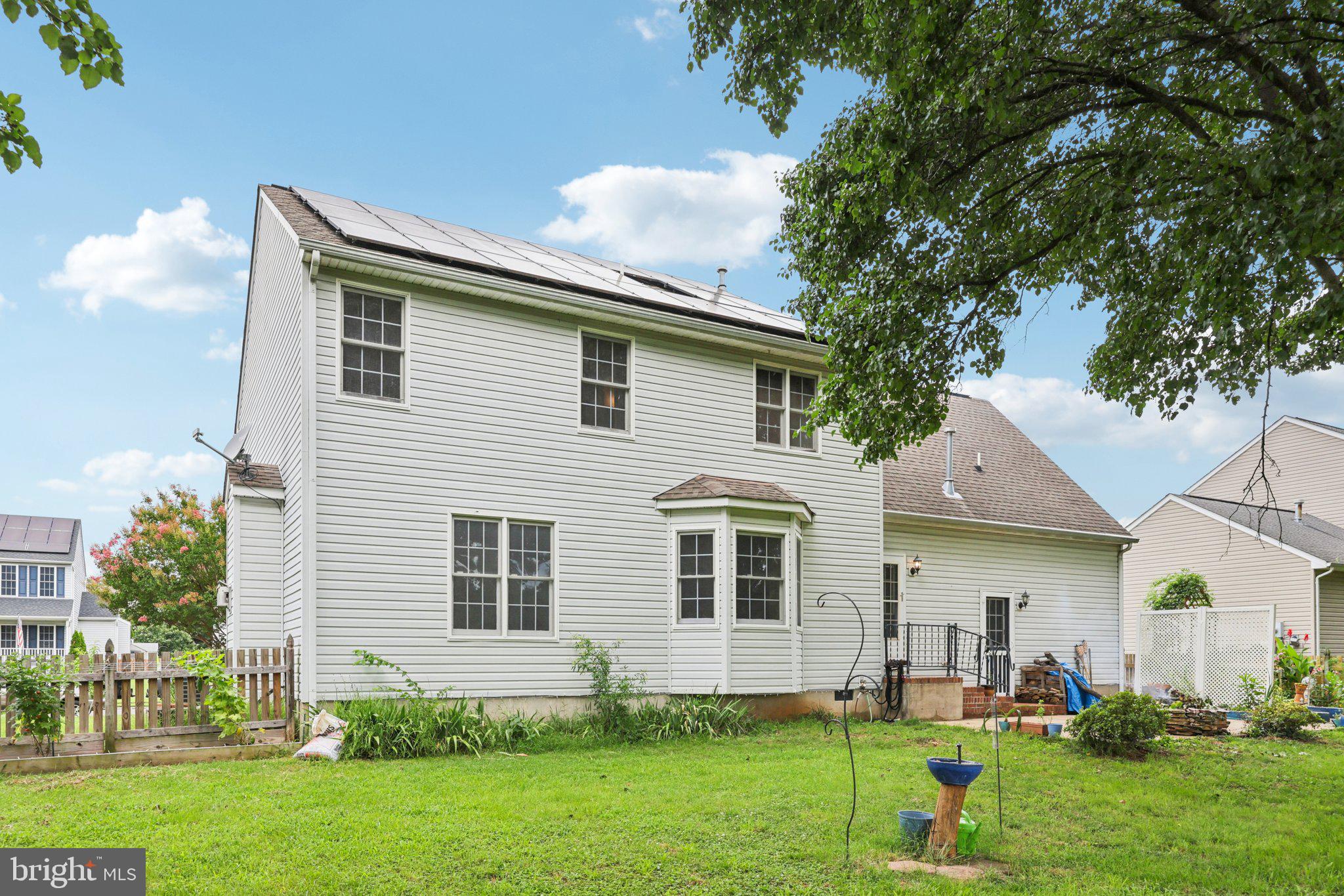 11607 River Meadows Way Fredericksburg, VA 22408 - Photo 59 of 67 a front view of house with yard and green space