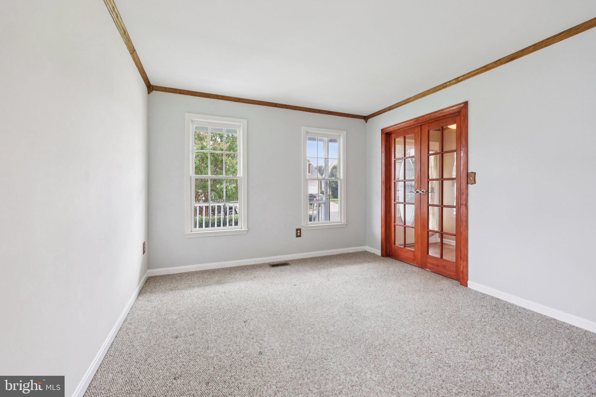 11607 River Meadows Way Fredericksburg, VA 22408 - Photo 8 of 67 an empty room with windows