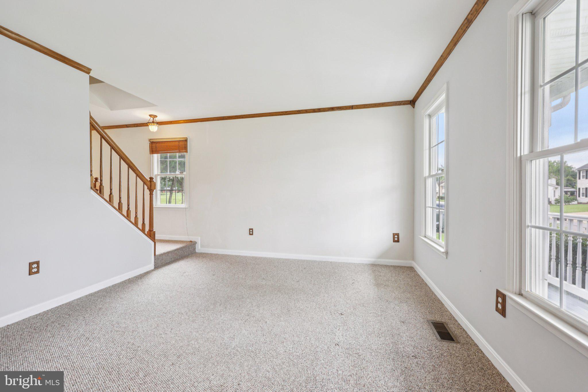 11607 River Meadows Way Fredericksburg, VA 22408 - Photo 9 of 67 a view of an empty room with a window