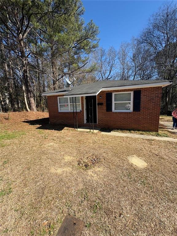 3483 Lawton Road Macon, GA 31204 - Photo 1 of 15 front view of house with a yard