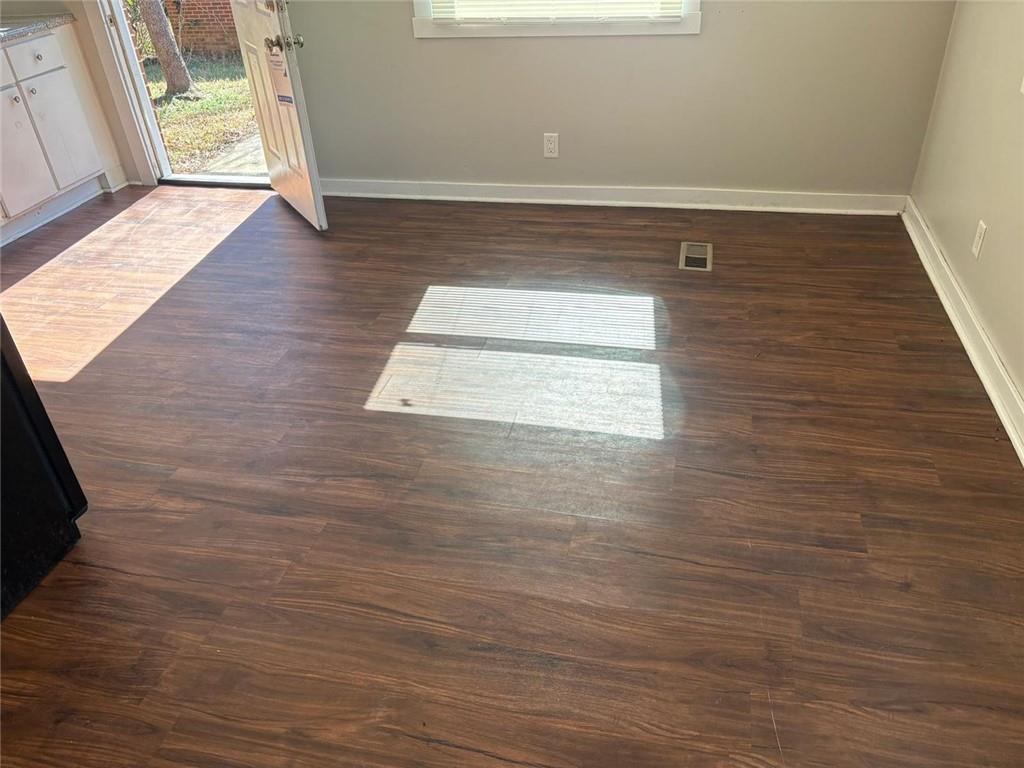 3483 Lawton Road Macon, GA 31204 - Photo 11 of 15 a view of room with window and wooden floor