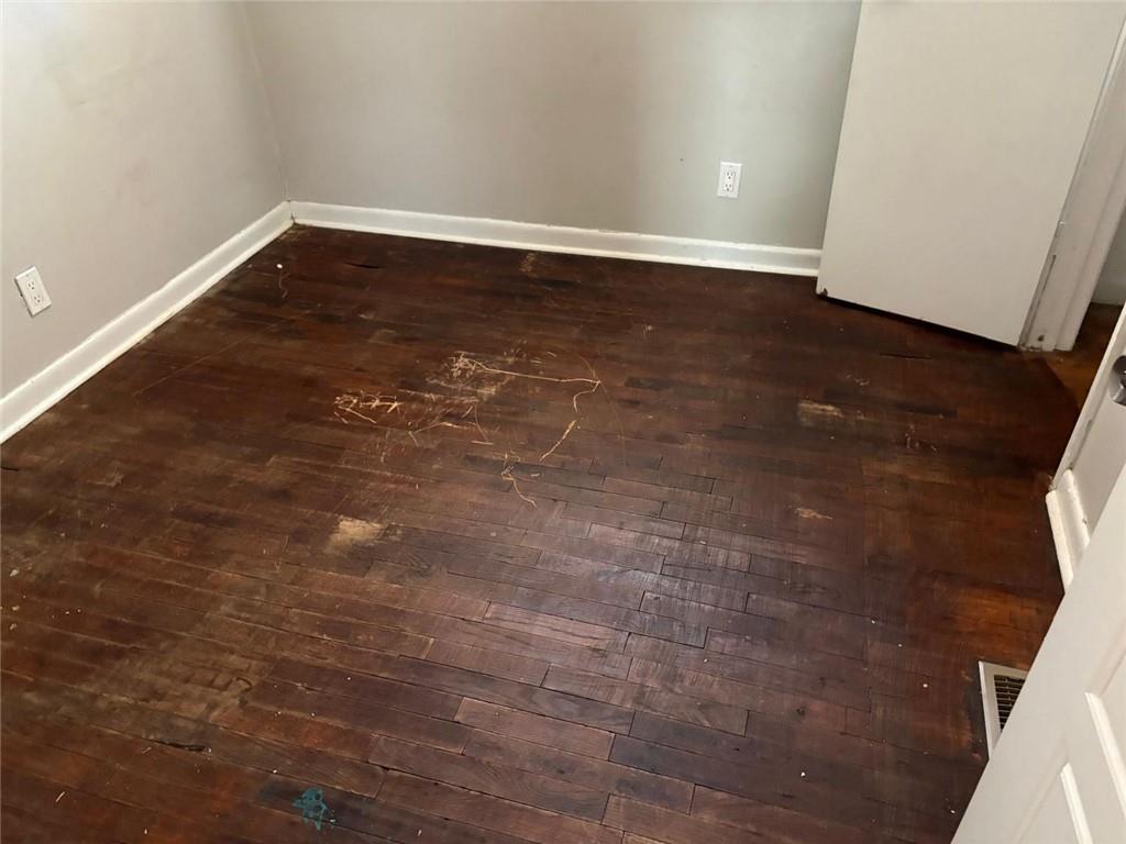 3483 Lawton Road Macon, GA 31204 - Photo 2 of 15 a view of room with wooden floor