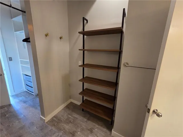 a view of entryway with wooden floor