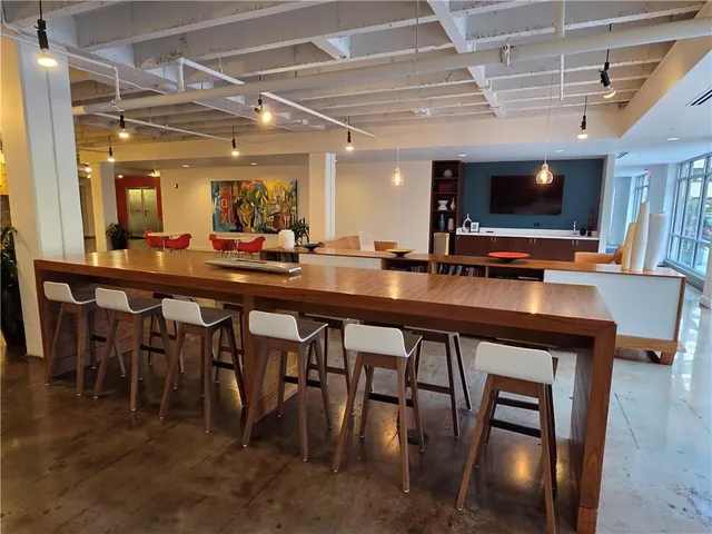 a view of an empty room with shelves