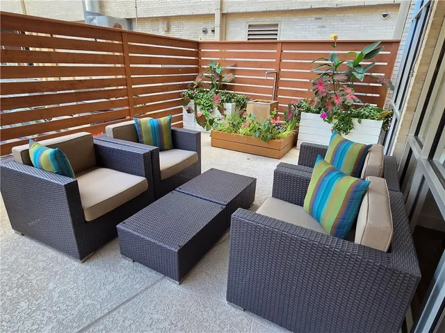 a view of a swimming pool with chairs