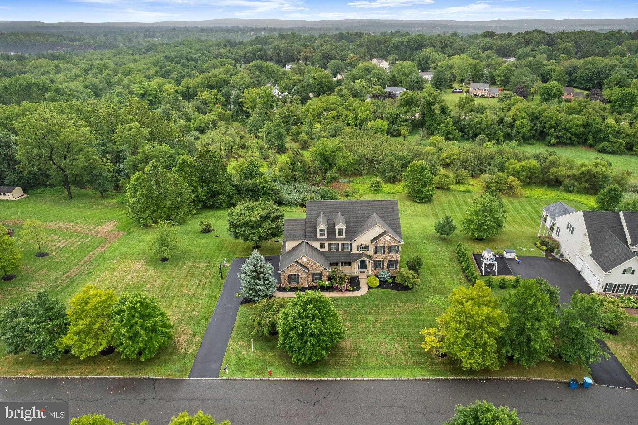 1368 Spring Hill Road Eagleville, PA 19403 - Photo 3 of 66 an aerial view of a house with a yard