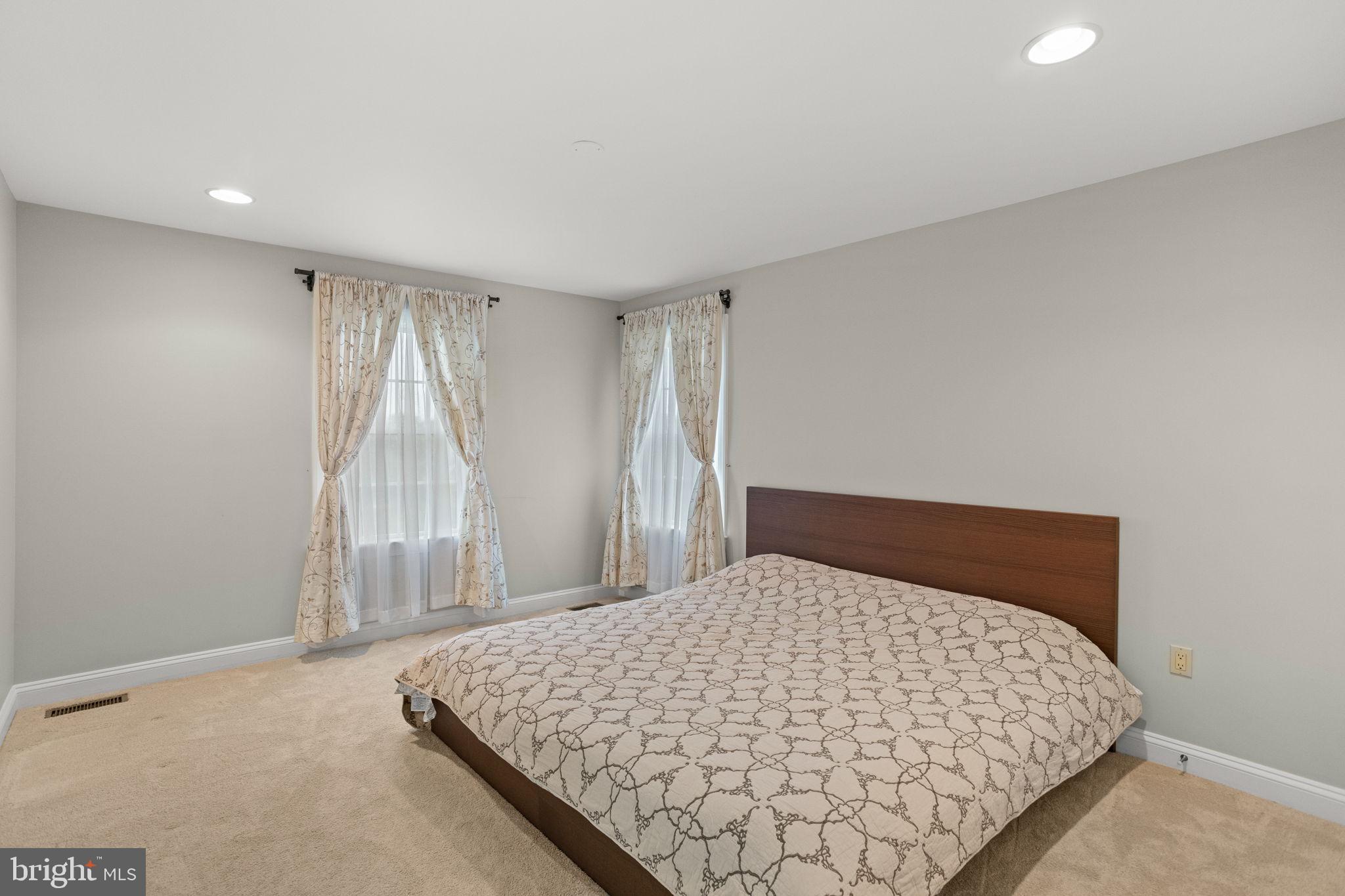 1368 Spring Hill Road Eagleville, PA 19403 - Photo 43 of 66 a bedroom with a bed and a window