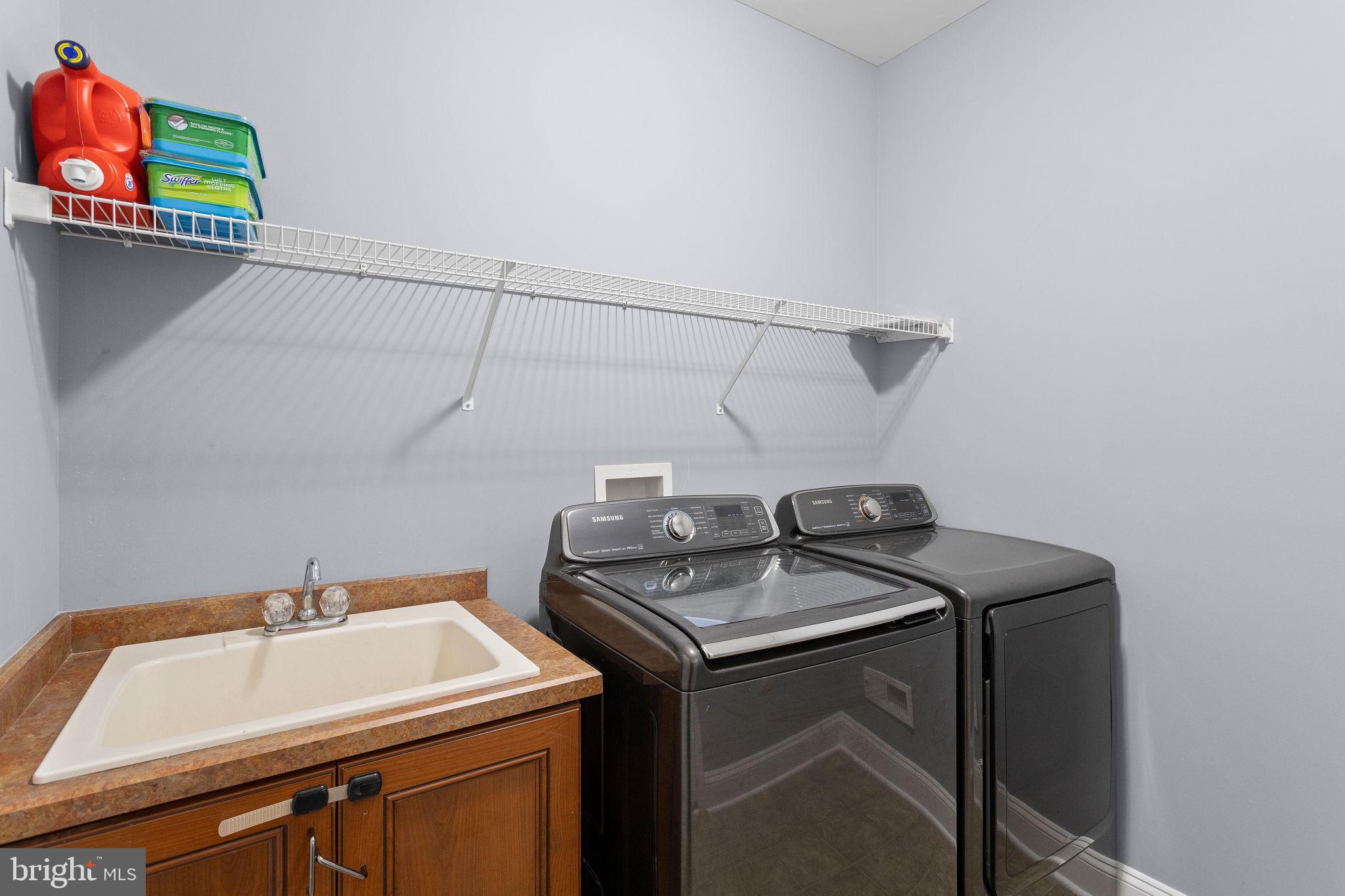 1368 Spring Hill Road Eagleville, PA 19403 - Photo 47 of 66 a utility room with dryer and washer