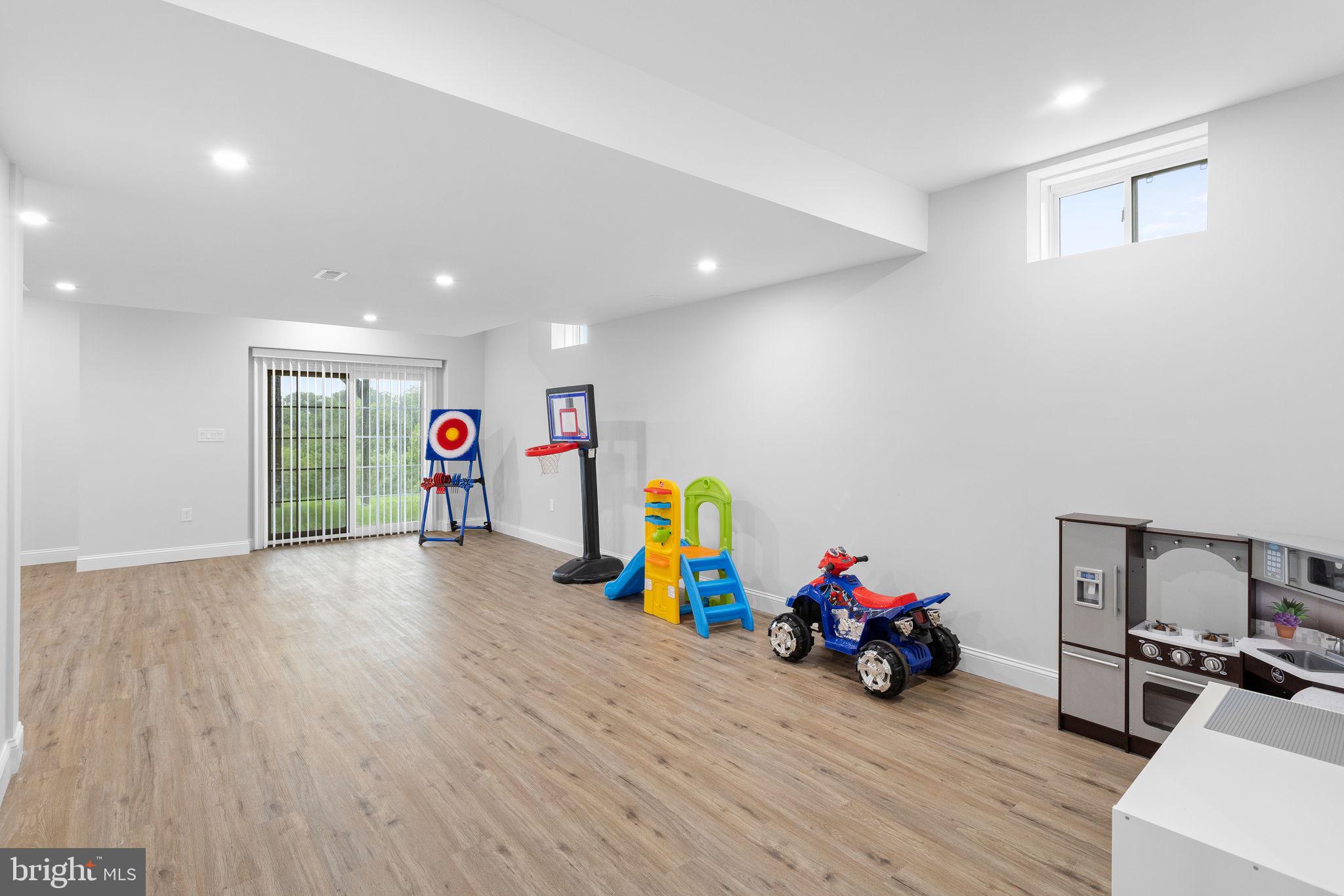 1368 Spring Hill Road Eagleville, PA 19403 - Photo 51 of 66 a view of a room with gym equipment and a window