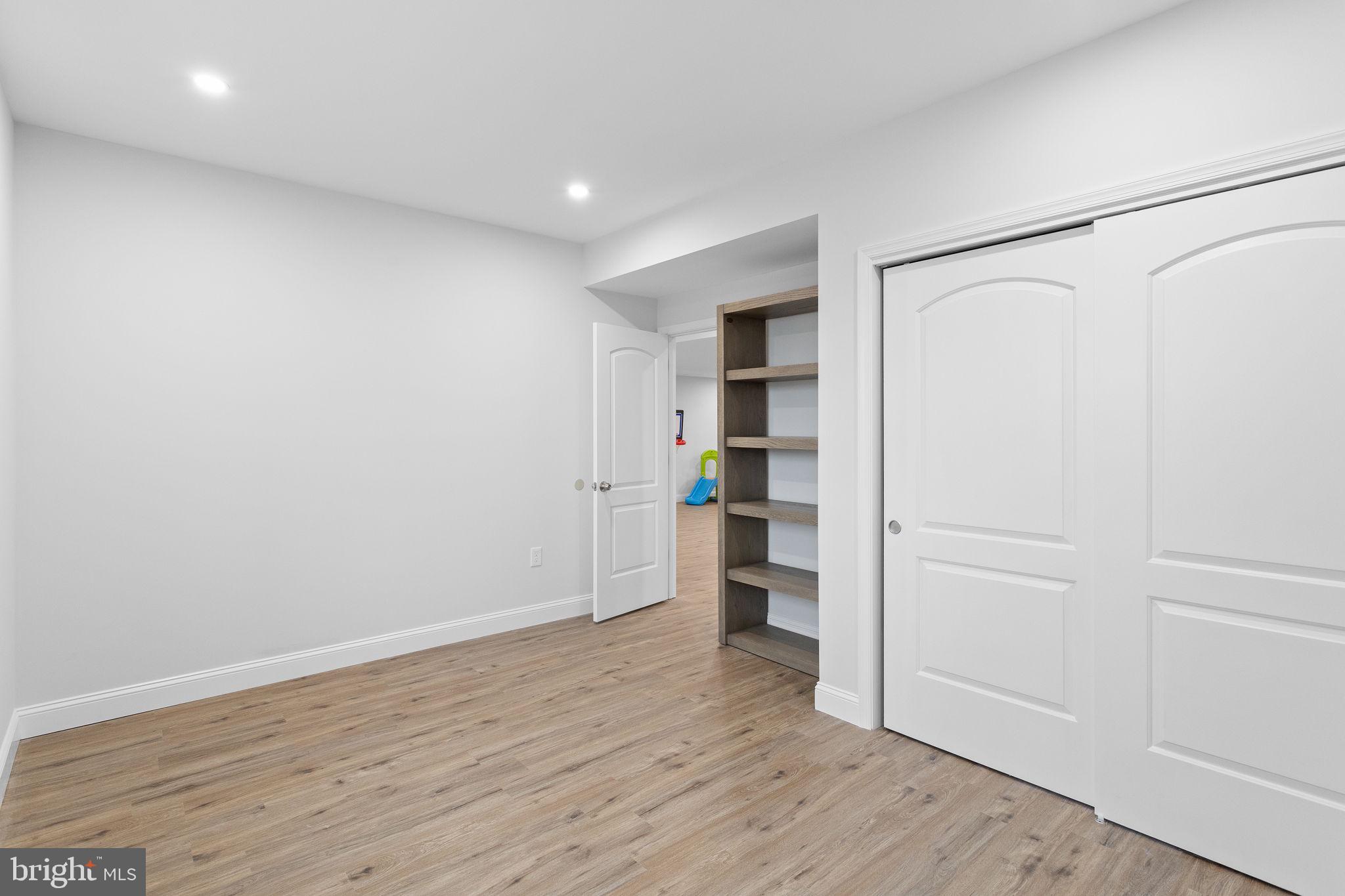 1368 Spring Hill Road Eagleville, PA 19403 - Photo 54 of 66 a view of empty room with wooden floor