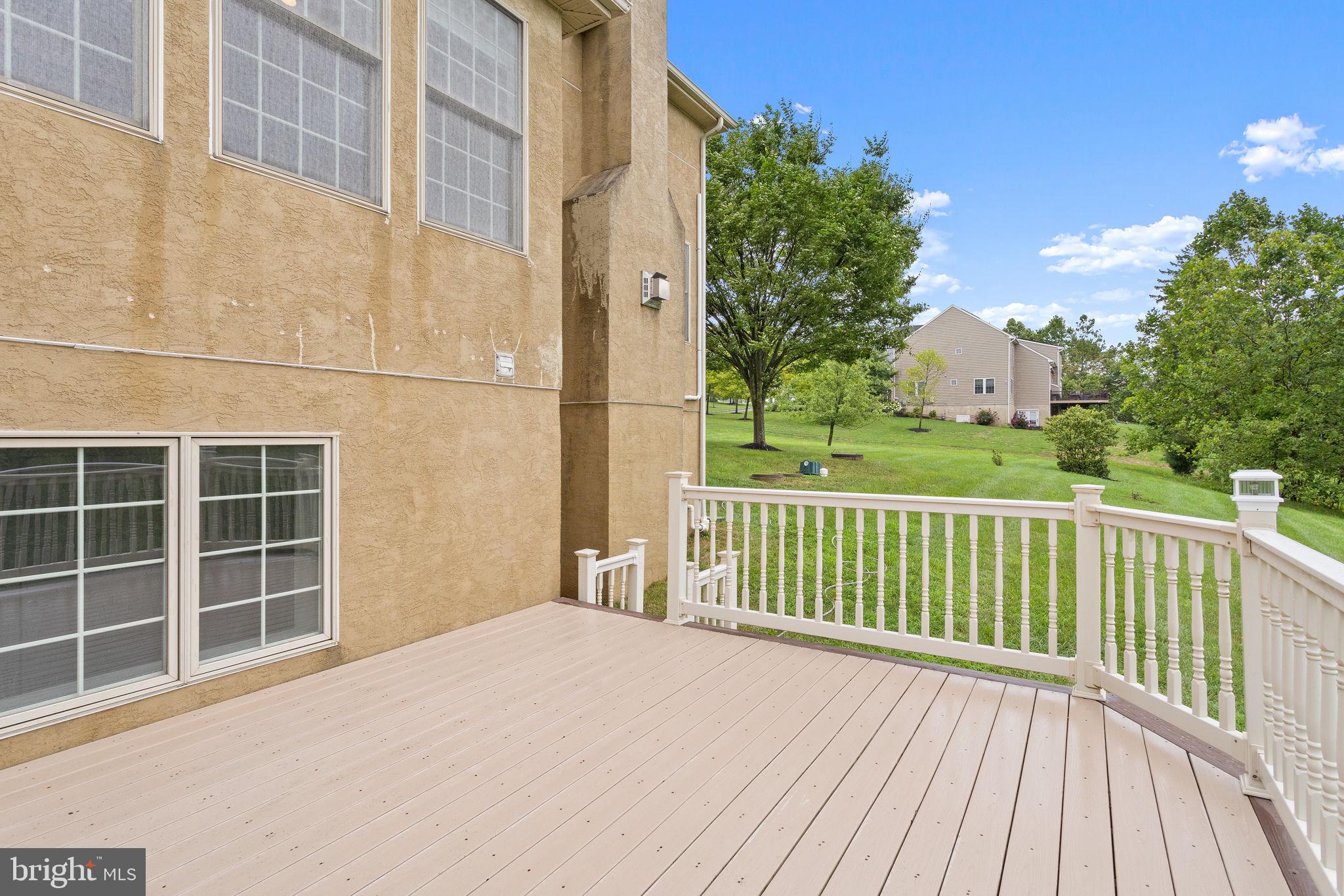 1368 Spring Hill Road Eagleville, PA 19403 - Photo 60 of 66 a view of a balcony with wooden floor and fence