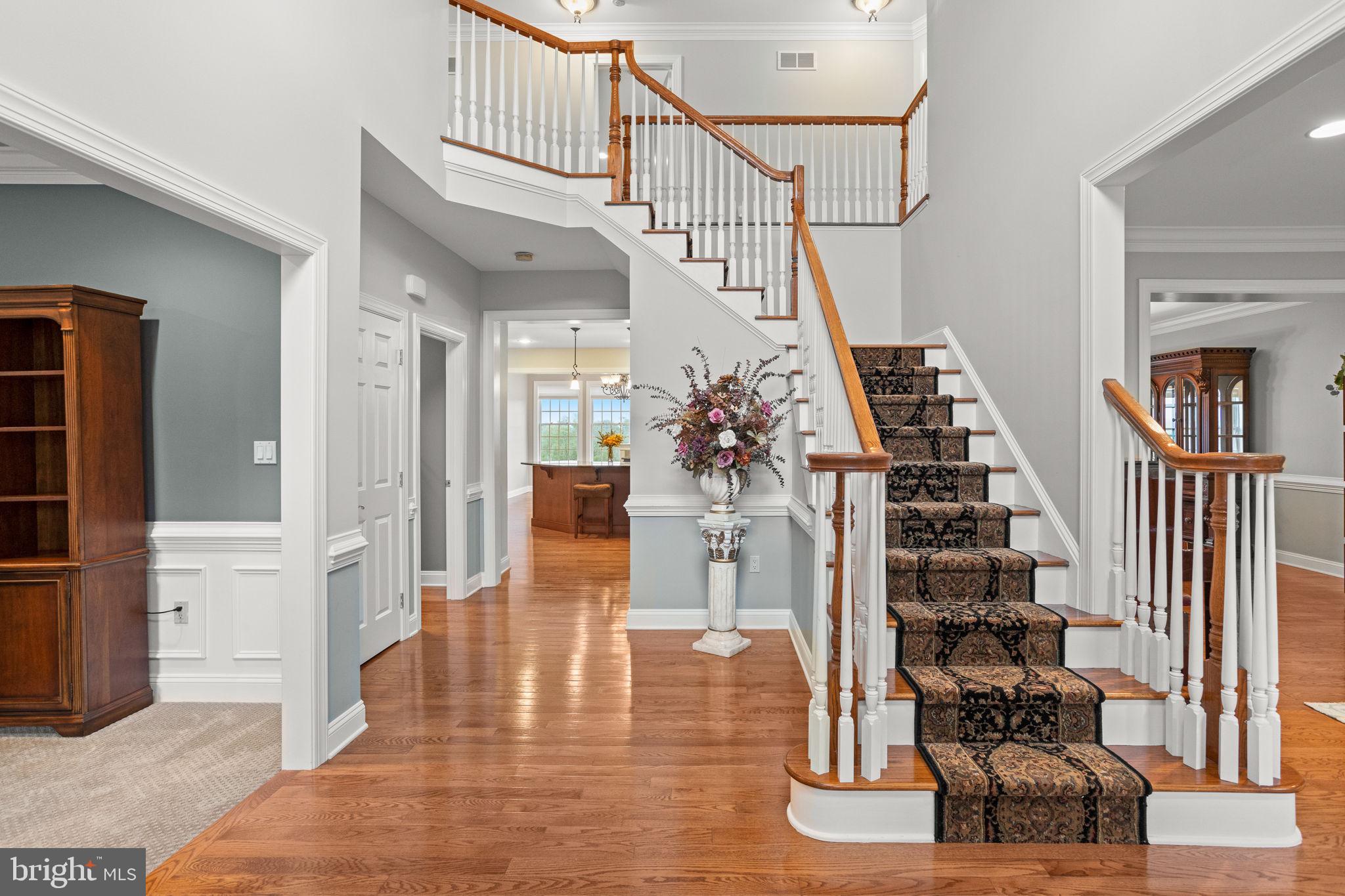 1368 Spring Hill Road Eagleville, PA 19403 - Photo 7 of 66 a view of entryway and hall with wooden floor