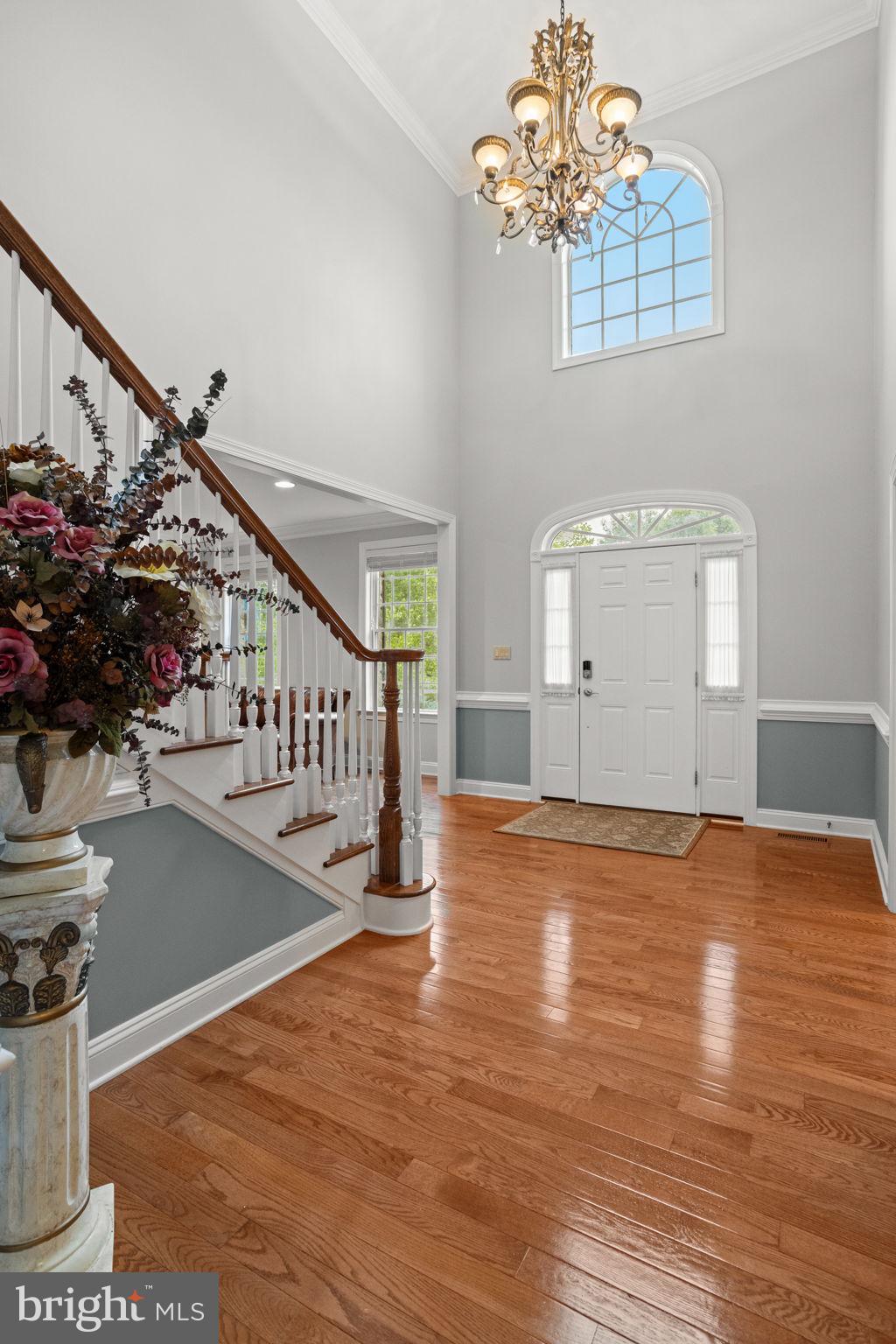 1368 Spring Hill Road Eagleville, PA 19403 - Photo 8 of 66 a view of entryway and hall with wooden floor